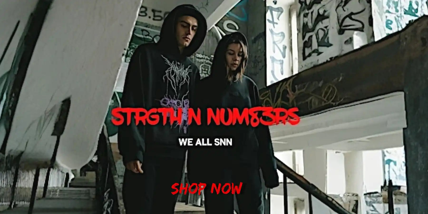 Fashion advertisement featuring two hooded figures.